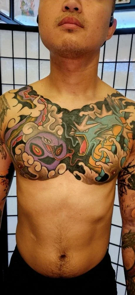 Chest tattoo — custom color work